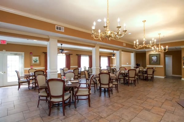 Dining area with tables and chandeliers