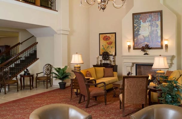 Elegant common area with seating and decorative art