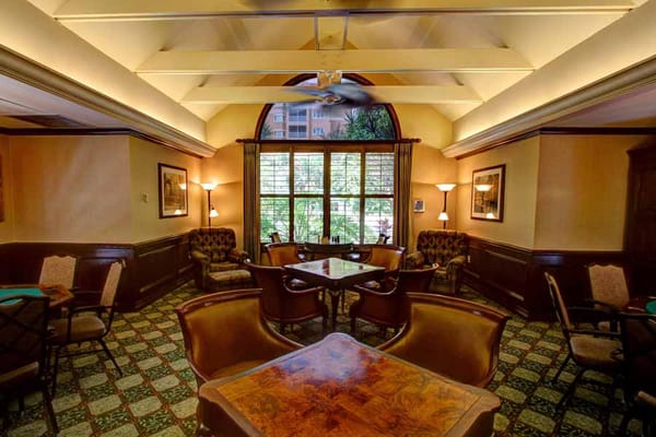 Lounge area with comfortable seating and large windows