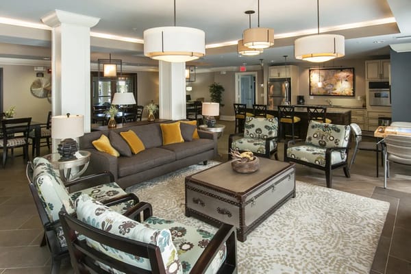 Bright common area with comfortable seating and decor