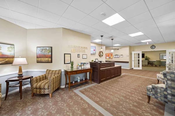 Cozy lobby with seating and reception desk