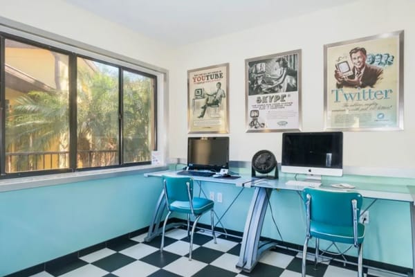 Interior view of a computer area with chairs