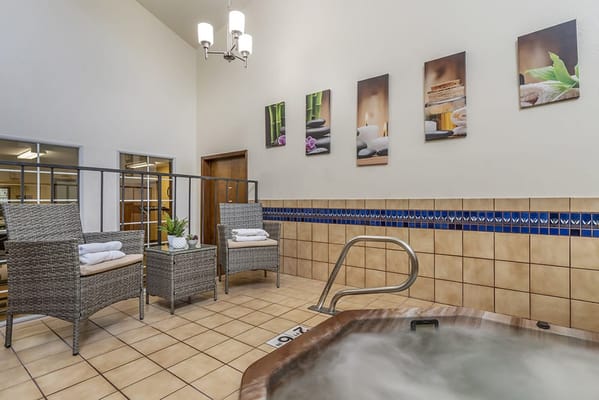 Interior view of a serene relaxation area with a hot tub