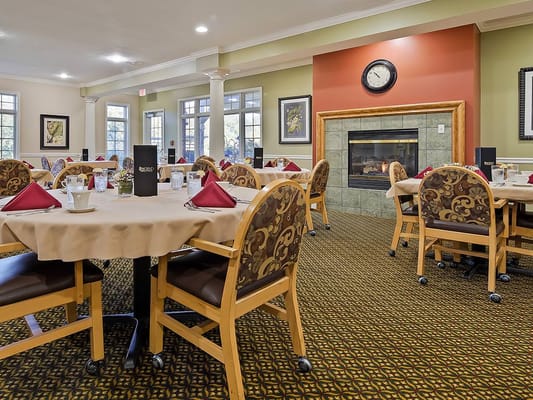 Cozy dining area with tables set for a meal