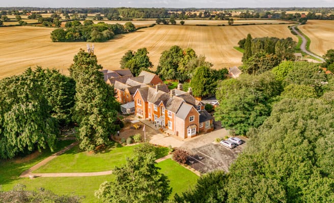 Aerial view of Hadleigh Care Home surrounded by greenery