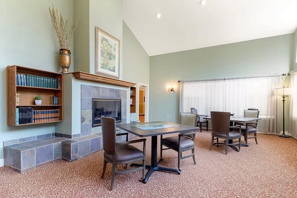 Common area with a fireplace and seating