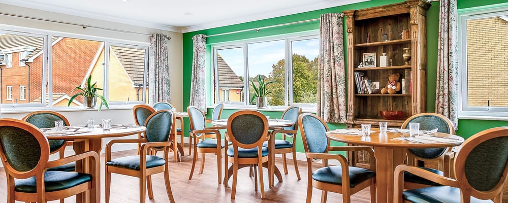 Bright dining area with tables and chairs