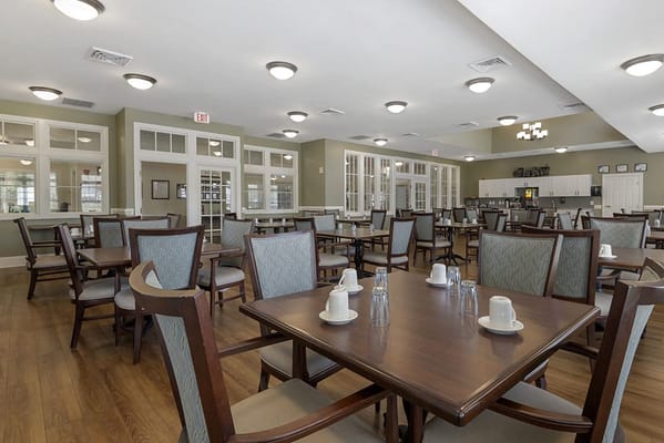 Interior view of the dining room with tables and chairs