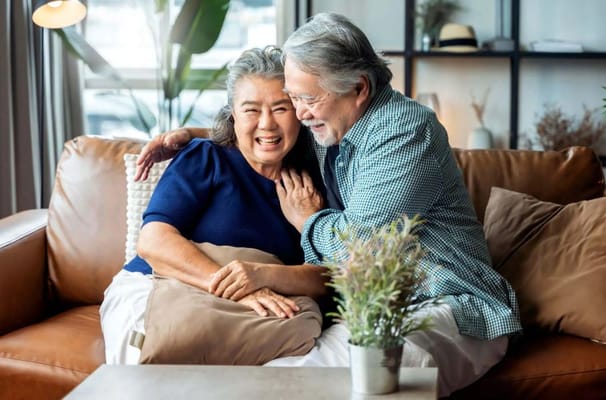 Happy senior couple enjoying time together indoors