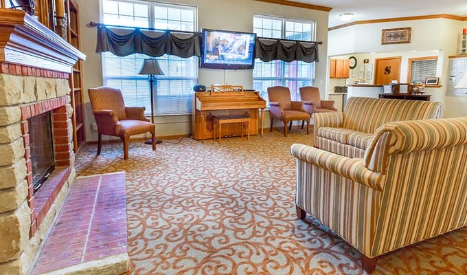 Interior view of a cozy common area with seating