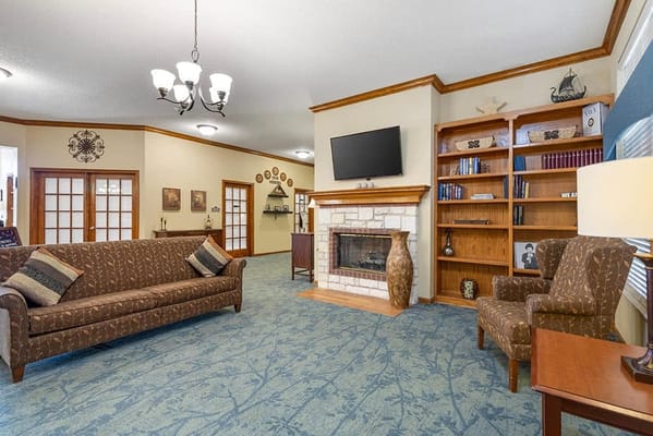Cozy common area with seating and fireplace
