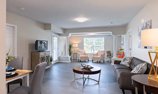 Bright interior common area with seating and decor