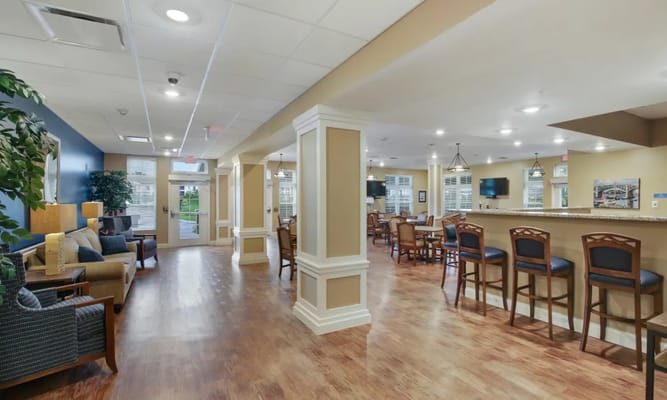 Interior view of a lounge area in a senior living facility