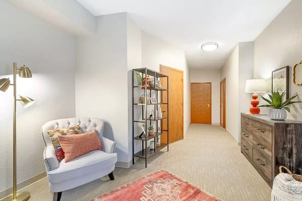 Bright corridor with seating and decor in a nursing home