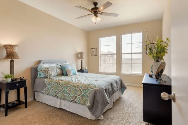 Well-decorated private resident room with natural light