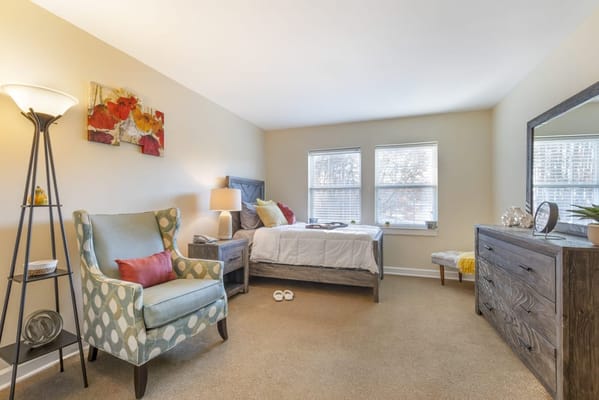 Cozy resident room with comfortable furniture and decor