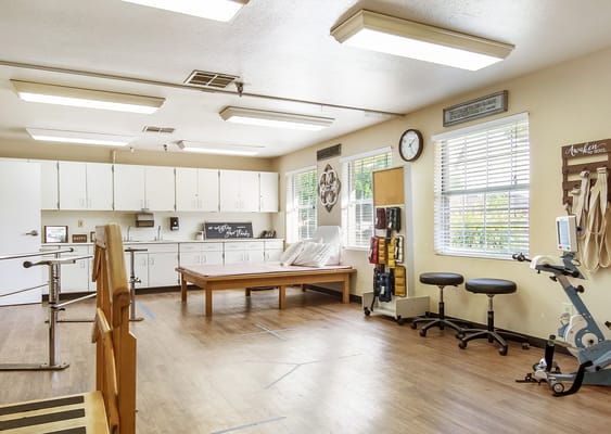 Interior view of a rehabilitation room with equipment