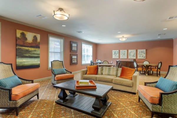 Bright common area with comfortable seating and decor