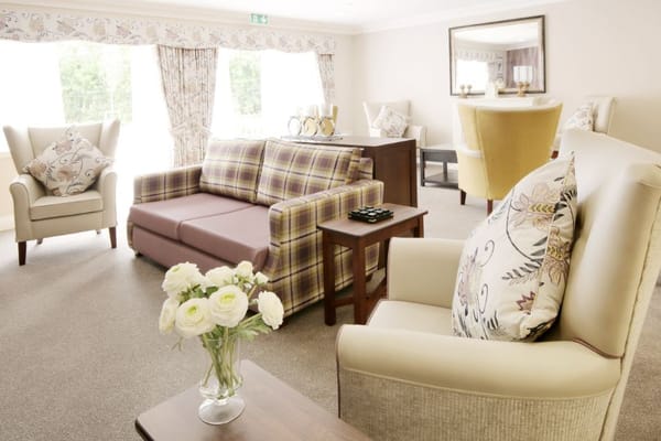 Bright common area with seating and decorative elements