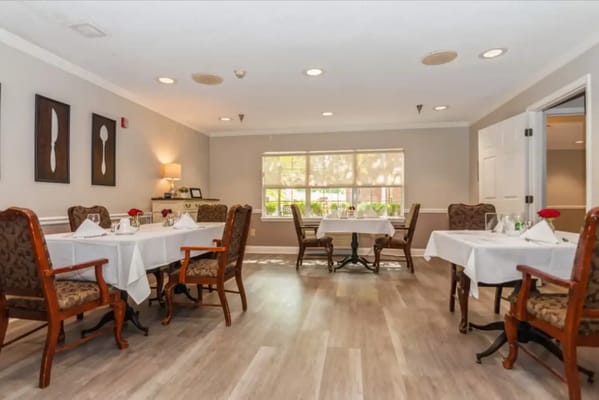 Elegant dining area with set tables
