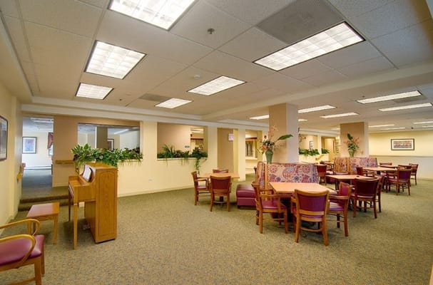 Spacious dining area with tables and chairs