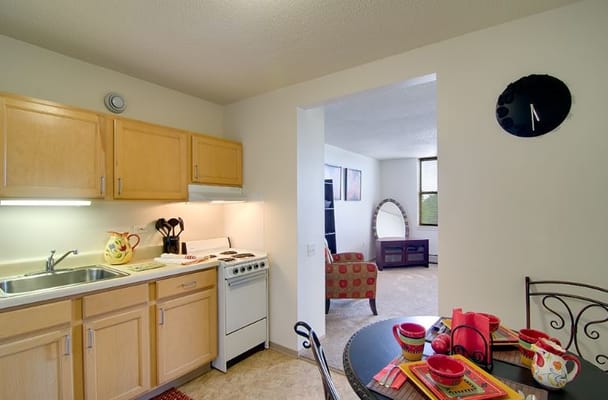 Bright kitchen with dining area and living room view