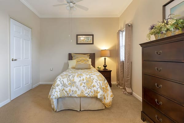 Cozy resident room with yellow decor