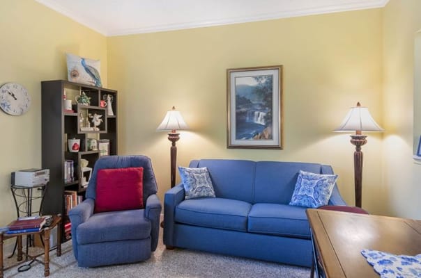 Cozy interior living space with sofa and lamps