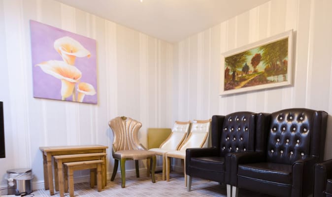 Cozy common area with seating and artwork