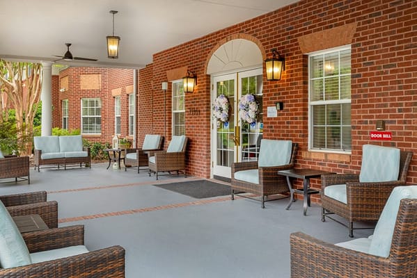 Cozy seating area with wicker chairs and welcoming decor