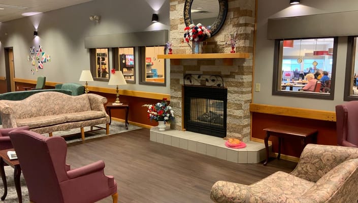 Cozy common area with comfortable seating and fireplace