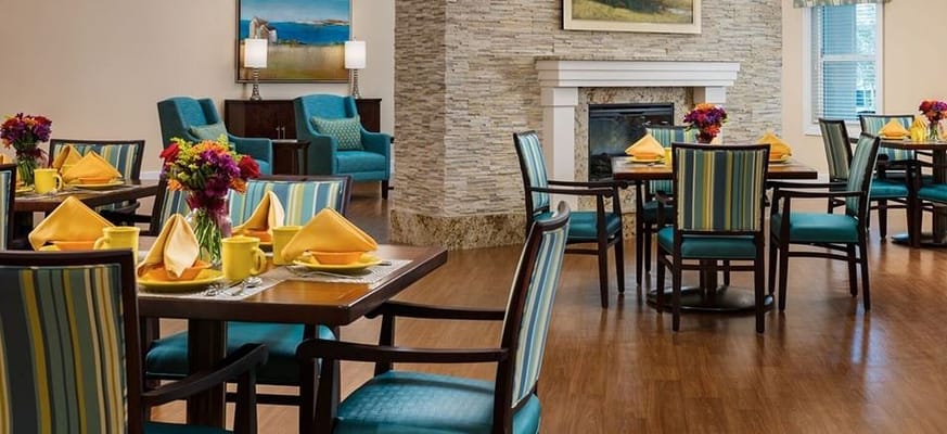 Bright dining room setup with colorful table settings