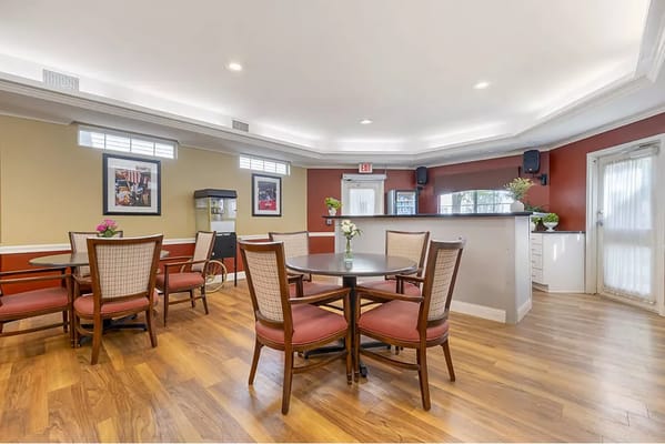 Bright common area with tables and chairs