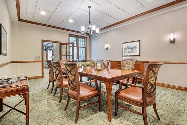 Interior dining room with a large table and chairs