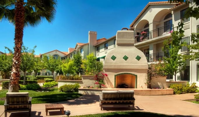 Outdoor garden space with seating and greenery