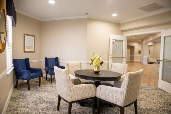 Interior common area with seating and floral decor