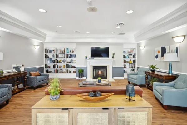 A comfortable living room with seating and a fireplace