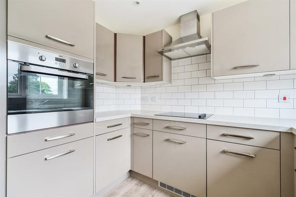 Stylish kitchen with modern cabinets and appliances