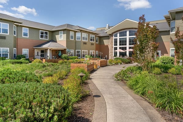Front exterior of Brookdale Newberg with landscaped pathway