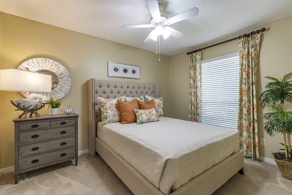 Cozy resident room featuring a bed and decor
