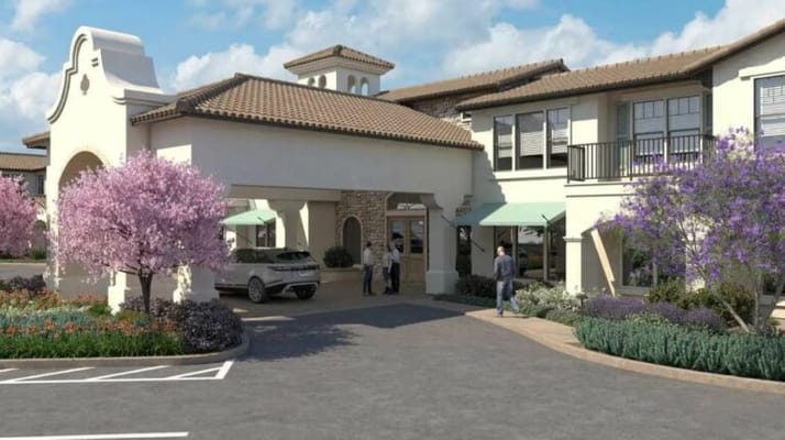 Exterior view of Oakmont of Camarillo with blooming flowers