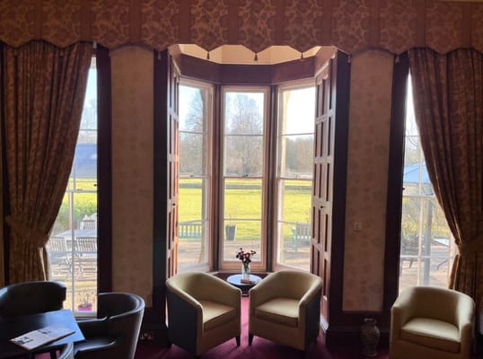 Cozy interior view with window overlooking the garden