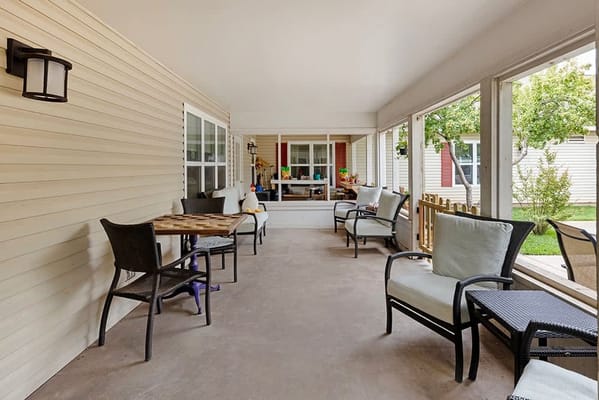 Covered outdoor seating area with chairs