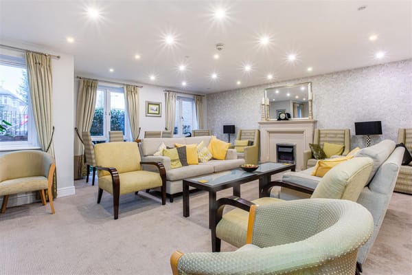 Comfortable lounge area with seating and natural light