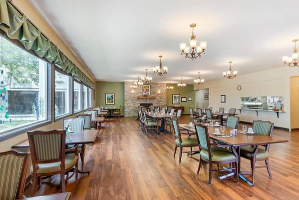 Interior view of the dining room with tables set