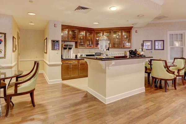 Cozy bistro area with wooden cabinets and seating
