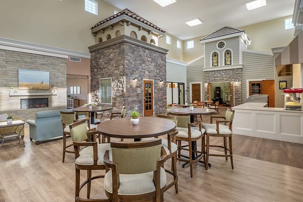 Bright common area with spacious seating and large windows