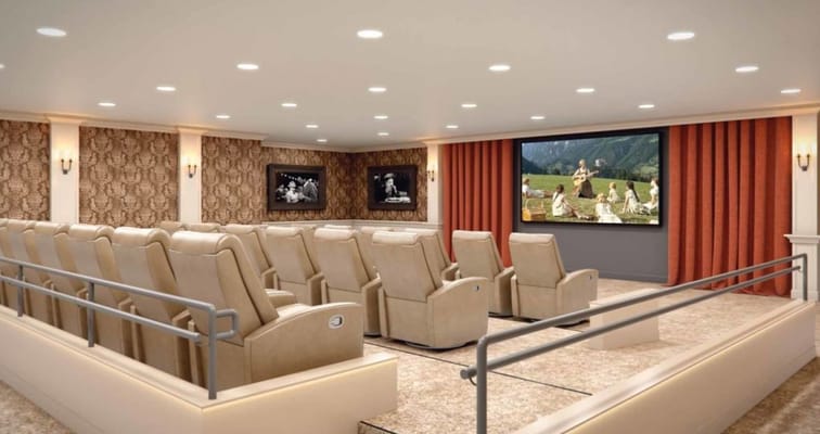 Theater room with reclining seats and a large screen
