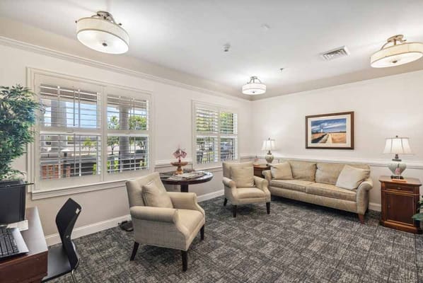Cozy living room with comfortable seating and windows