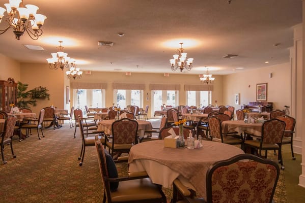 Dining room area with tables and chairs